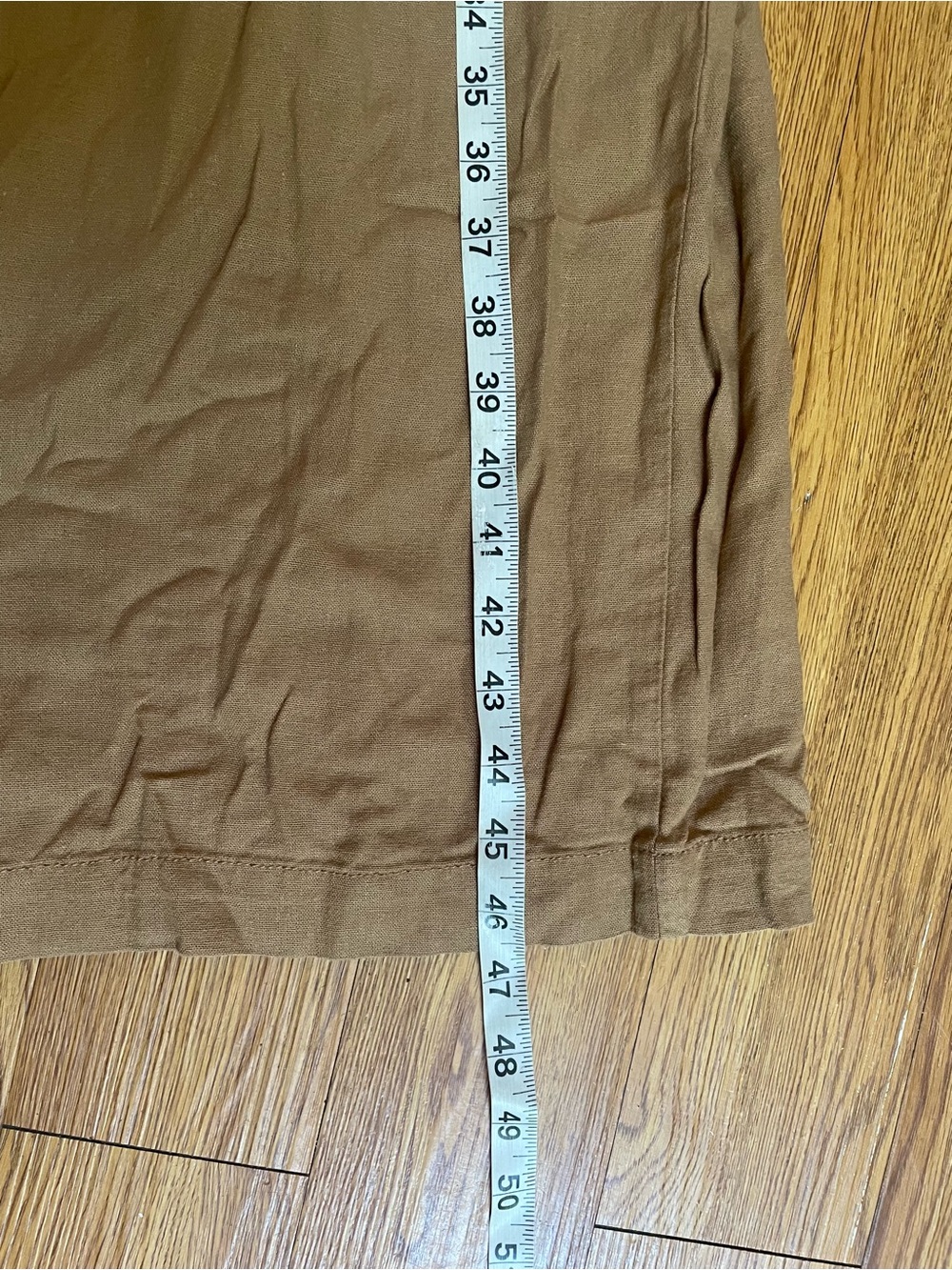 Calvin Klein Sleeveless V-Neck Wide-Leg Jumpsuit in Camel - Picture 7 of 8